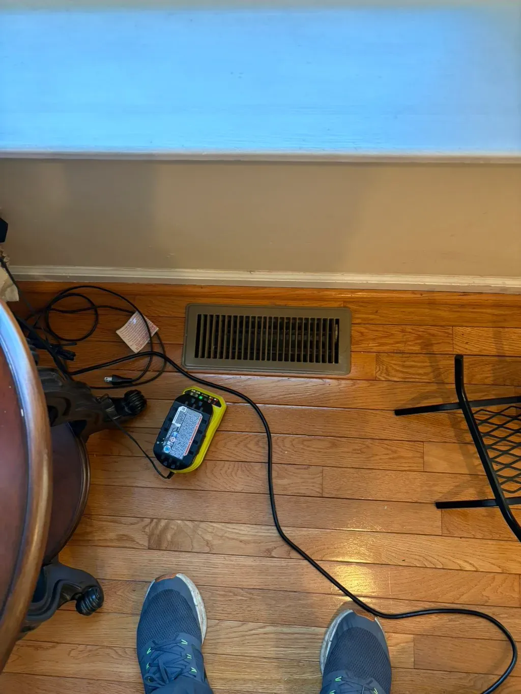 Air duct cleaning under way at a floor register